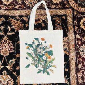 frog with dandelions white tote bag — 2010s